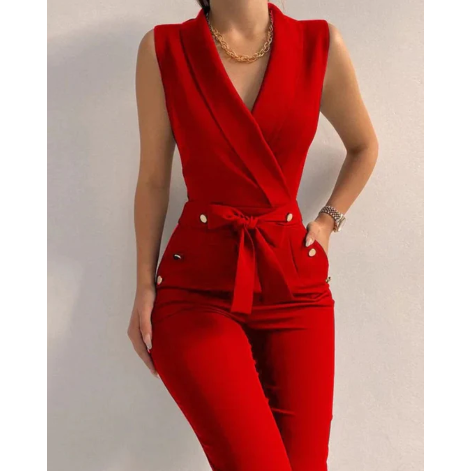 Women's red sleeveless wrap jumpsuit, tied waist, decorative button pocket details