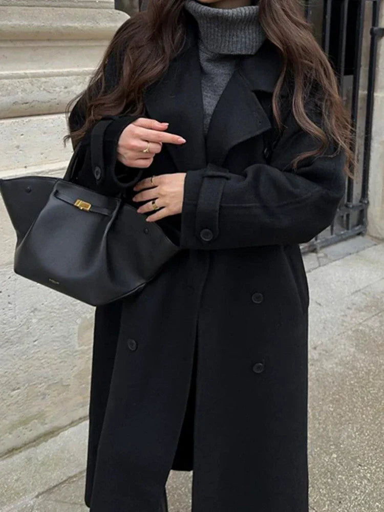 Women’s oversized wool-feel trench coat, black belted with buttoned cuffs and wide lapels