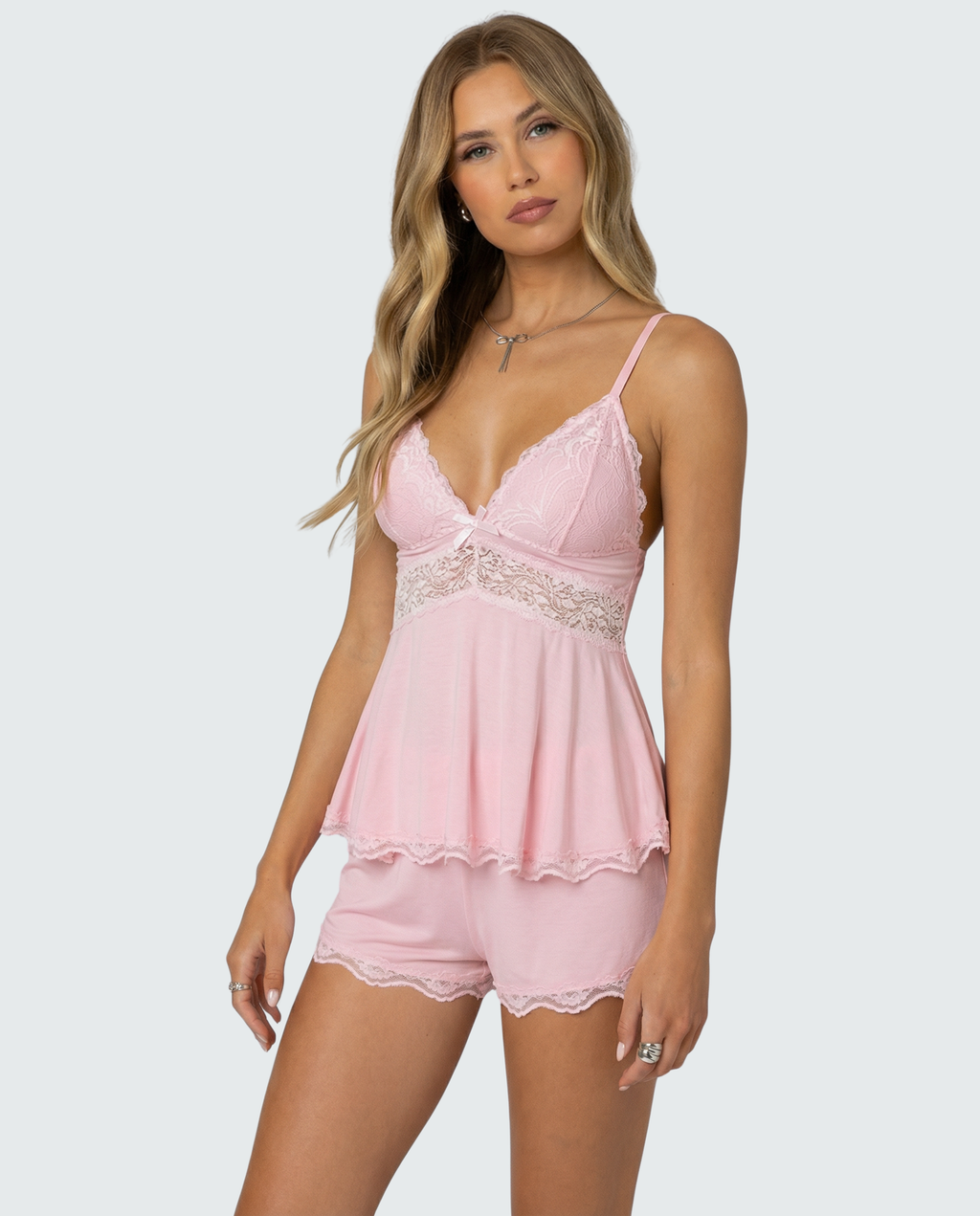 Soft pink lace-trim cami and shorts set with V-neck lace bust and scalloped hem