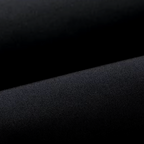 Close-up of dark textured parka fabric with fine woven pattern