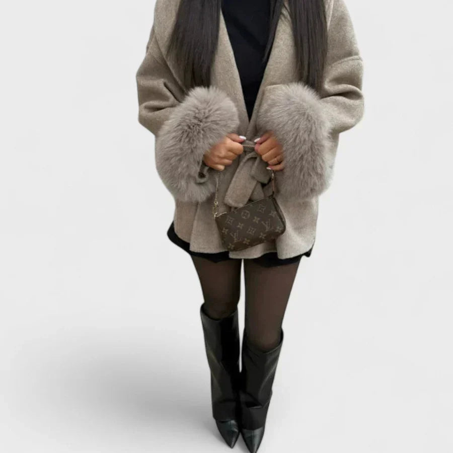 Beige coat with faux fur cuff trim and open V-neck