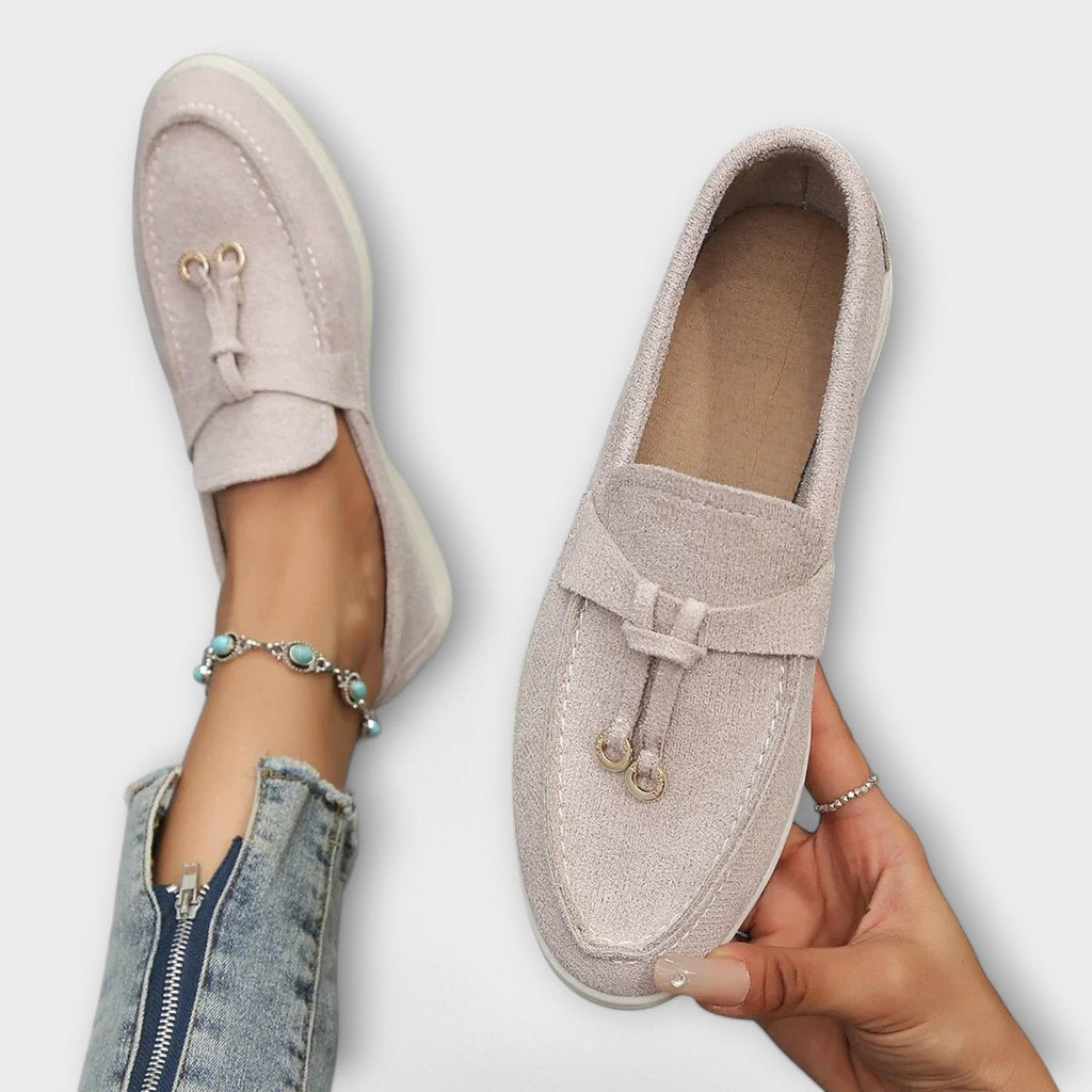 Women's beige suede slip-on loafers with bowknot detail and metal loops