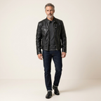 Men’s black synthetic leather jacket with zip front, stand collar, and chest pockets