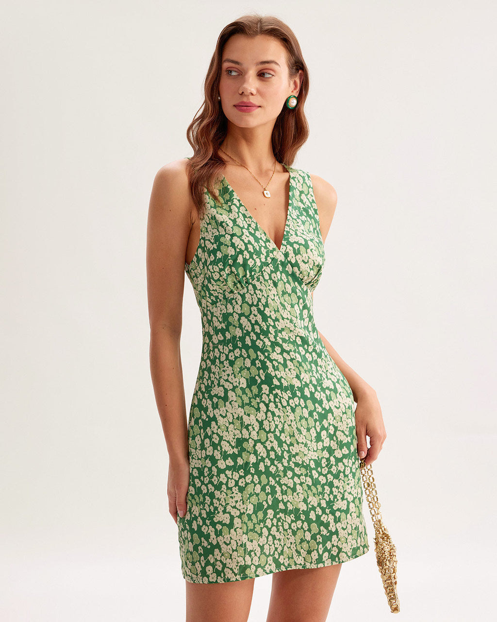 Green floral sleeveless mini A-line dress with V-neck and pleated waist