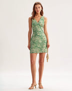 Green floral sleeveless mini A-line dress with V-neck, pleated waist, side tassel