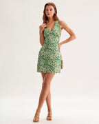 Green floral sleeveless mini A-line dress with V-neck and pleated waist