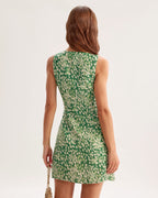 Green floral sleeveless mini A-line dress, open-back V shape, rear seam