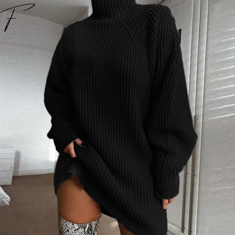 Black ribbed sweater dress with high neck, balloon sleeves, oversized fit, knit hem slit