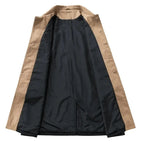 Long coat interior view with tan lining panels and dark inner fabric