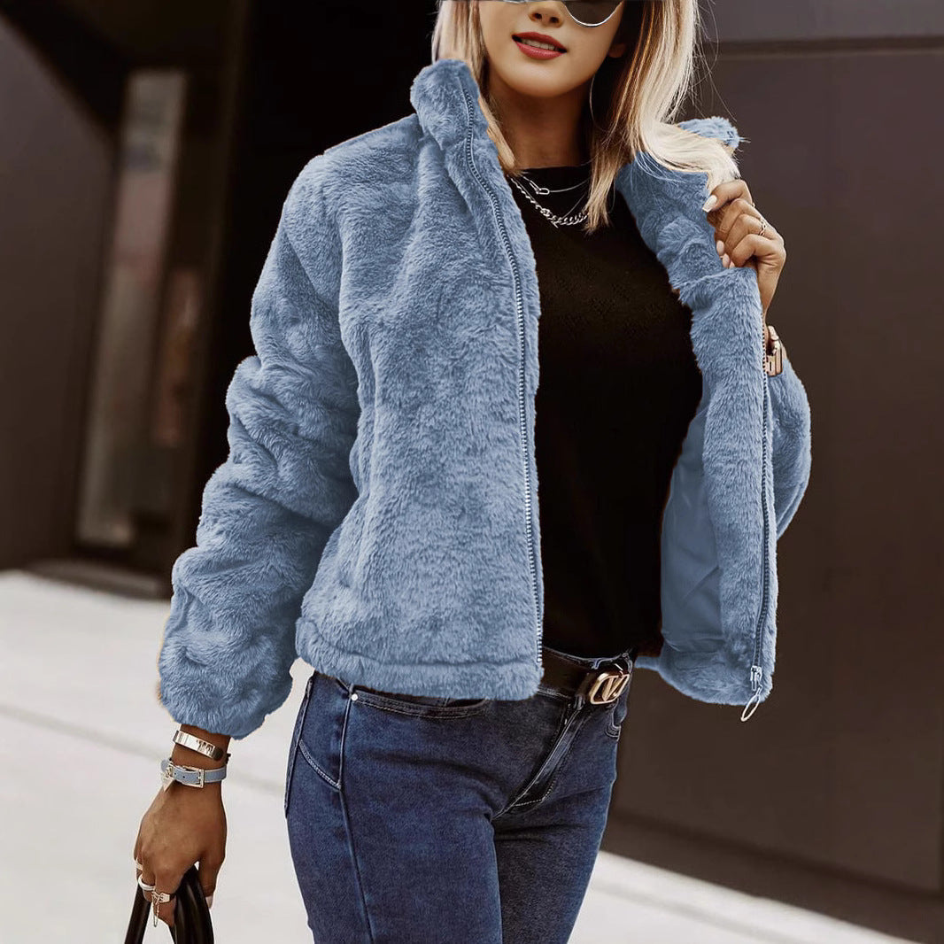 Blue teddy bomber jacket with zip front and high stand collar