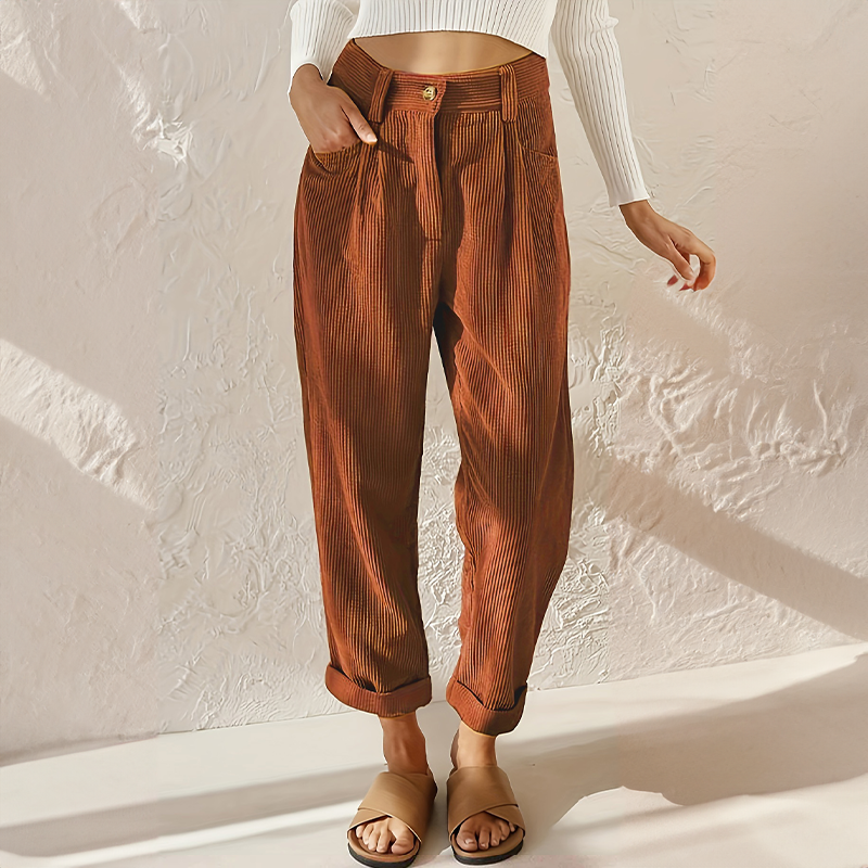 Rust brown corduroy trousers, high-waisted wide-leg with elasticated waist and button front