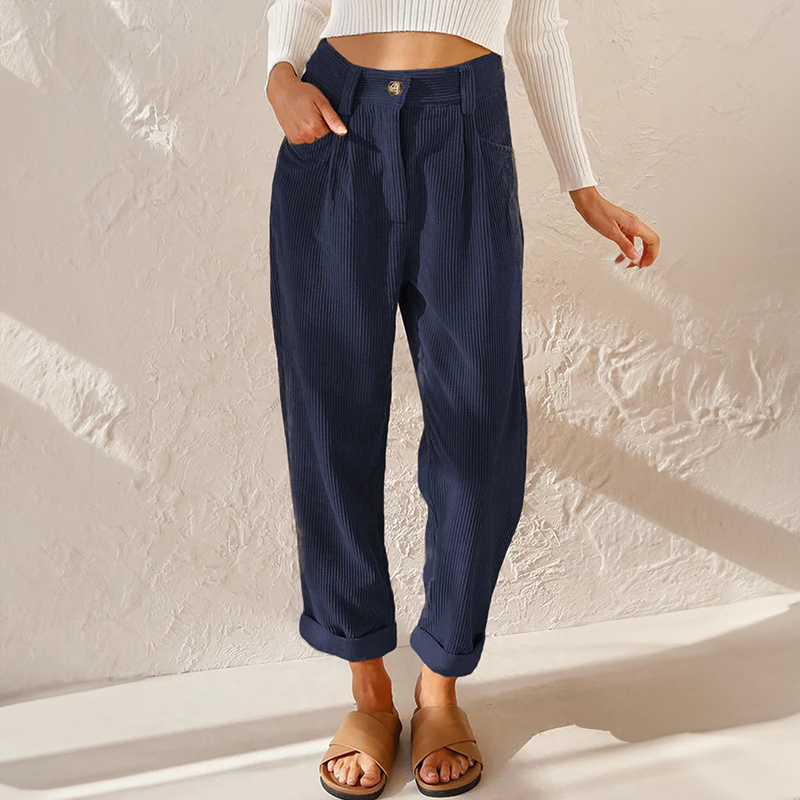 Navy blue corduroy trousers, high-waisted wide-leg with elasticated waist and button front
