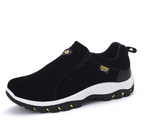 Men's black slip-on hiking shoes with padded collar, white sole, and treaded outsole