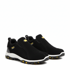Women's black padded hiking shoes with cushioned white sole and yellow tread