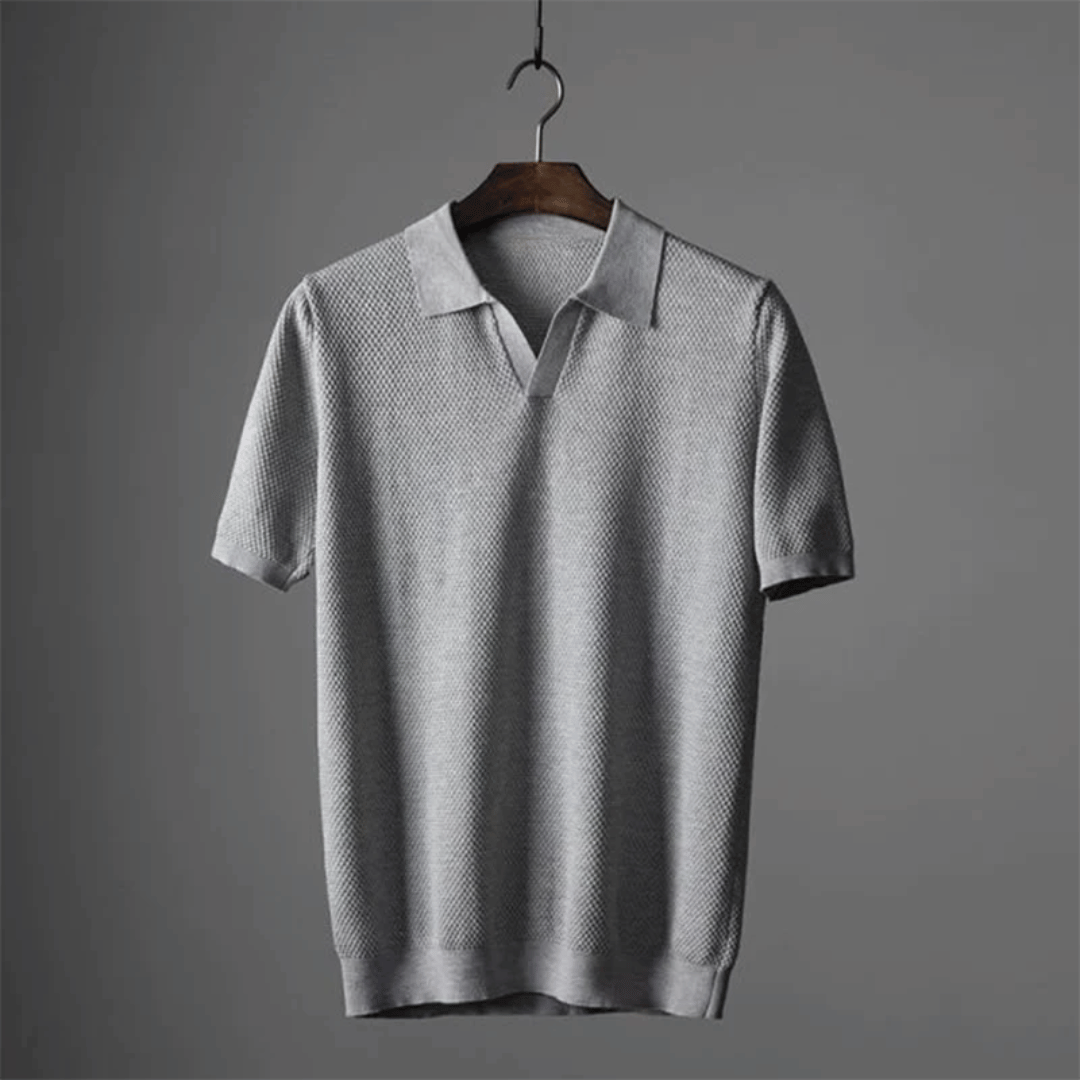 Light grey men's knitted polo shirt with short sleeves and ribbed button collar
