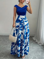 Blue sleeveless maxi dress with leaf print, V-neck wrap bodice and ankle-length skirt
