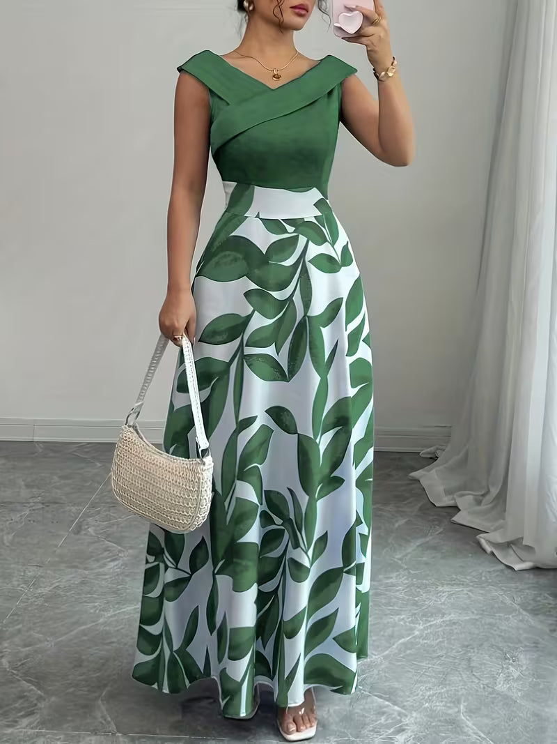 Green sleeveless maxi dress with leaf print, V-neck wrap bodice and flowing skirt