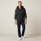 Men's black quilted hooded vest with zip front and side pockets