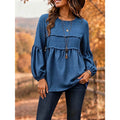 Blue relaxed peplum blouse with long puff sleeves and gathered waist, scoop neckline