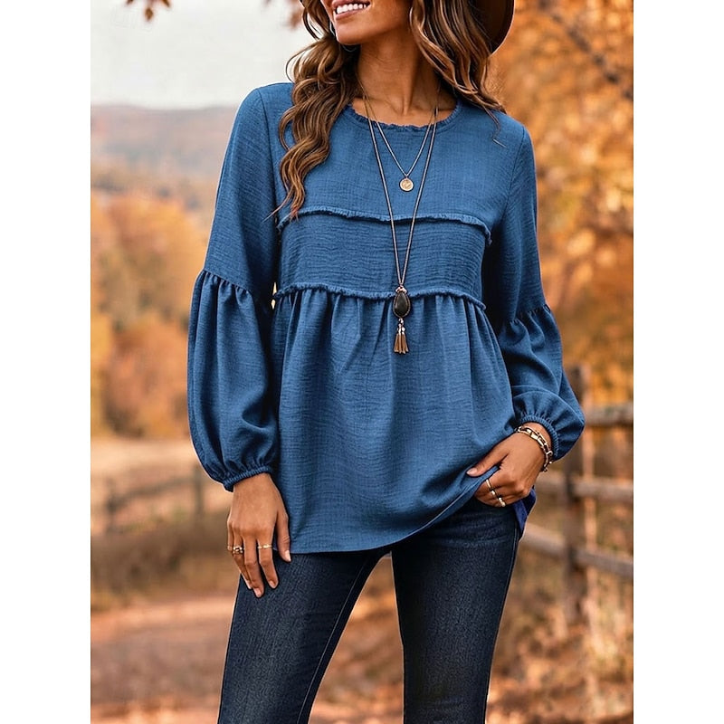 Blue relaxed peplum blouse with long puff sleeves and gathered waist, scoop neckline