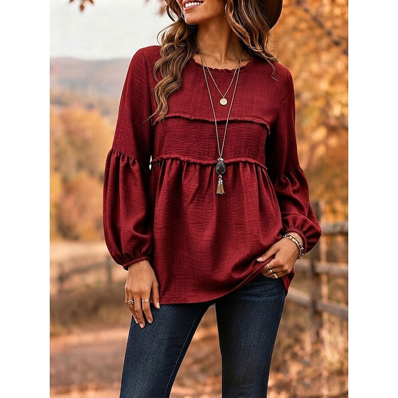 Red relaxed peplum blouse with long puff sleeves and gathered waist, scoop neckline