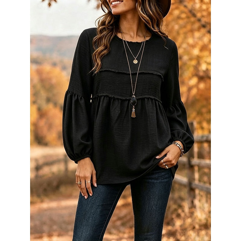 Black relaxed peplum blouse with long puff sleeves and gathered waist, scoop neckline