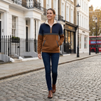 Women's half-zip sweater on model, fleece-lined sherpa collar, navy and brown colorblock