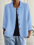 Light blue collared button-front jacket with 3/4 sleeves, woven relaxed fit