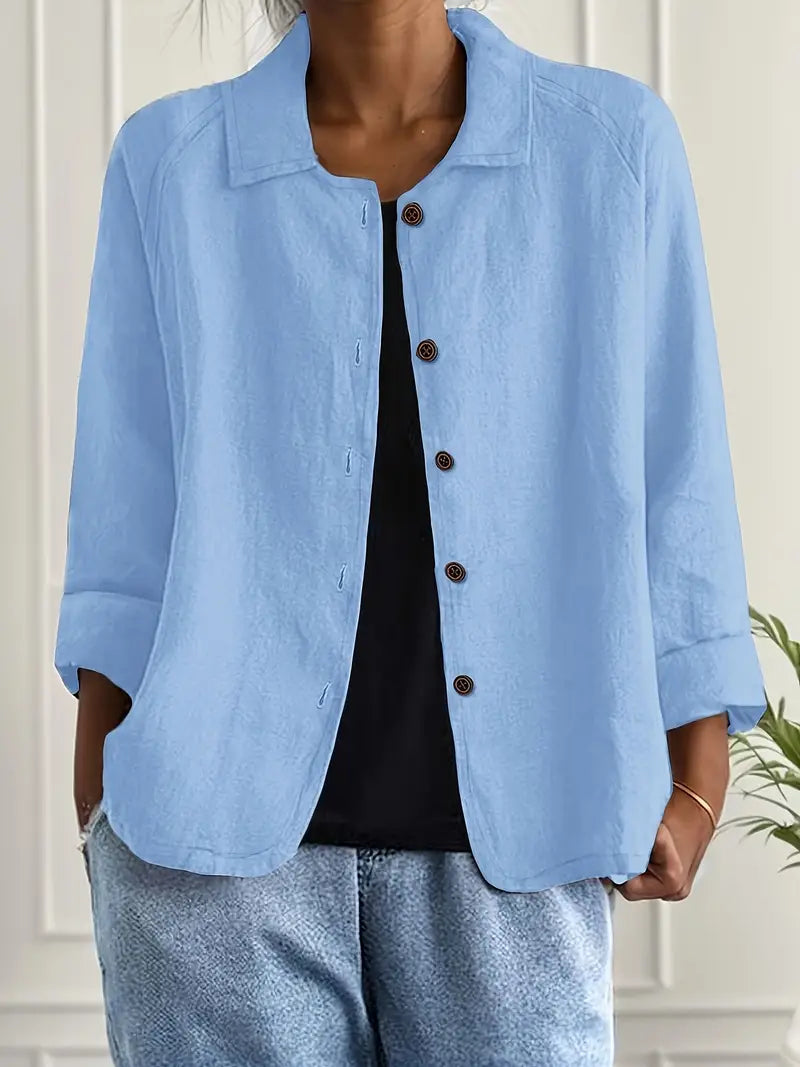 Light blue collared button-front jacket with 3/4 sleeves, woven relaxed fit