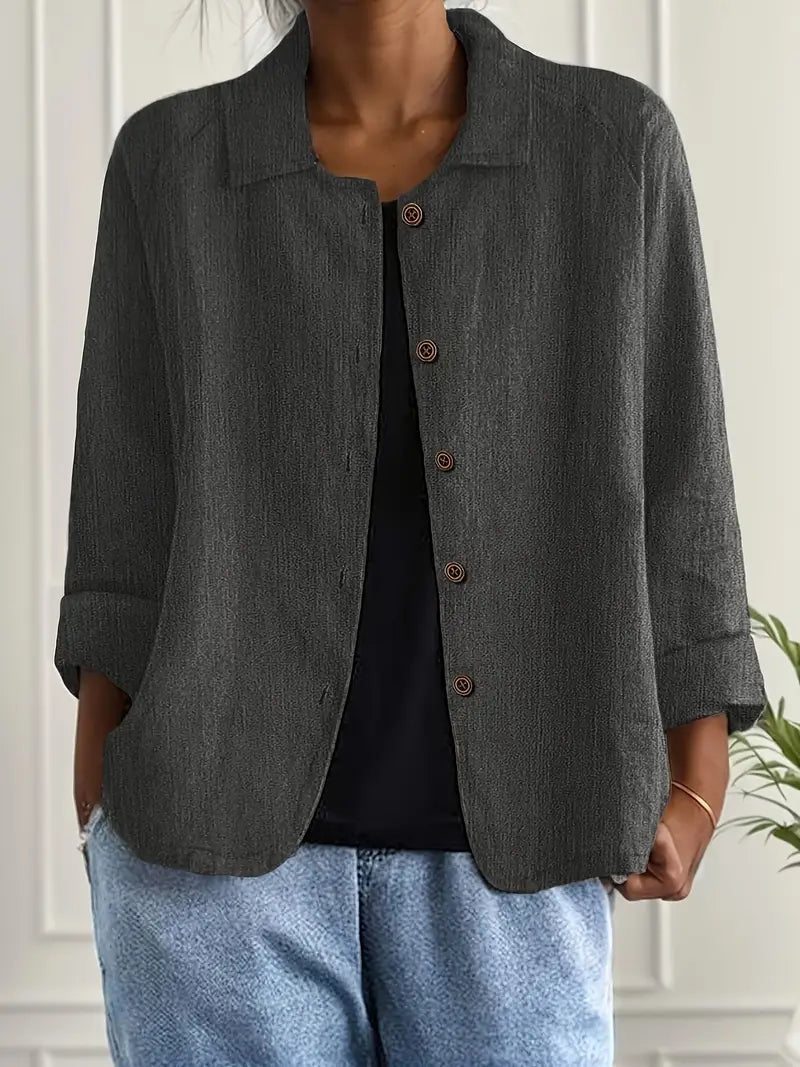 Women’s dark grey collared button-front jacket with three-quarter sleeves, relaxed fit