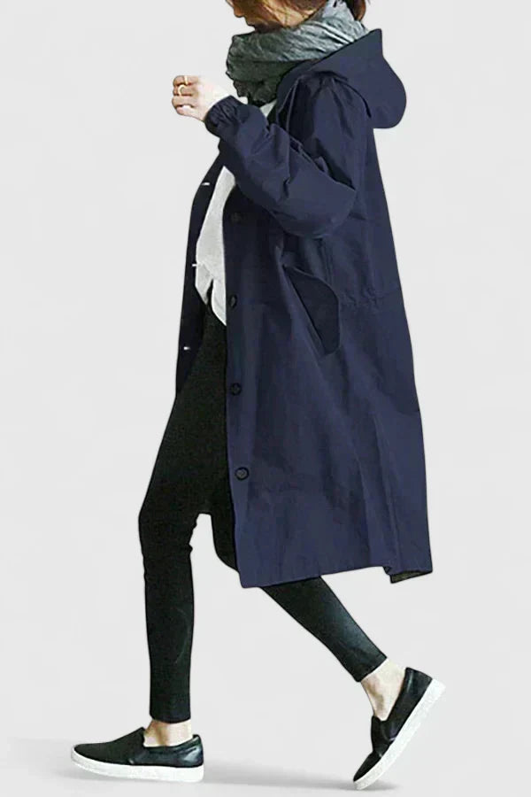 Navy blue hooded coat with button front and long sleeves, gathered hood
