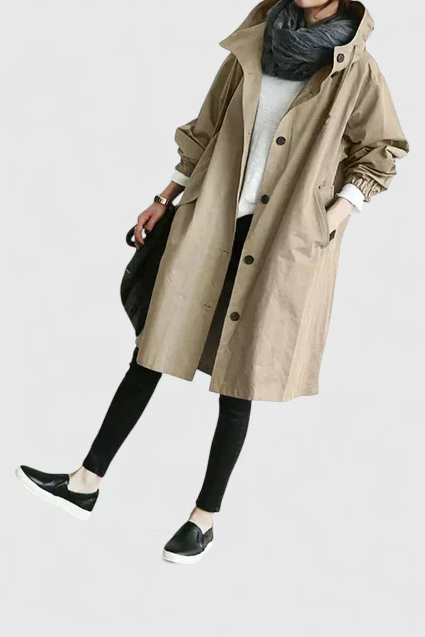 Beige hooded coat with button front and long sleeves, cuffed sleeves