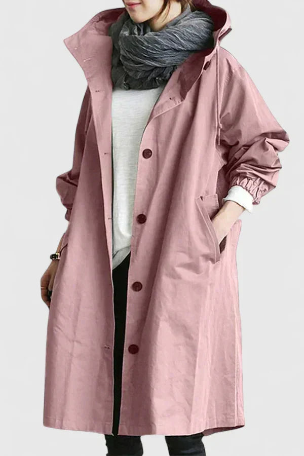 Pink hooded coat with button front and long sleeves, side pockets