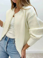 Ivory pearl-trim open-front knit cardigan with balloon sleeves and frayed hem