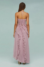 Pink halter ruffled maxi dress with open back and asymmetric layered hem