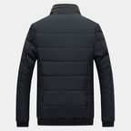 Black padded jacket back view with horizontal quilted panels