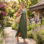 Women’s sleeveless round-neck maxi dress in dark green with side slit, flowy drape