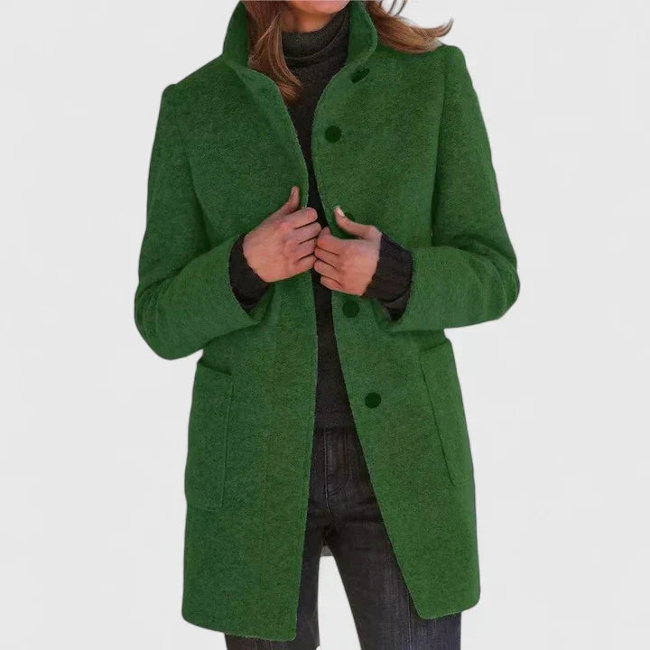 Dark green elegant coat with button front, notched lapels, and side pockets