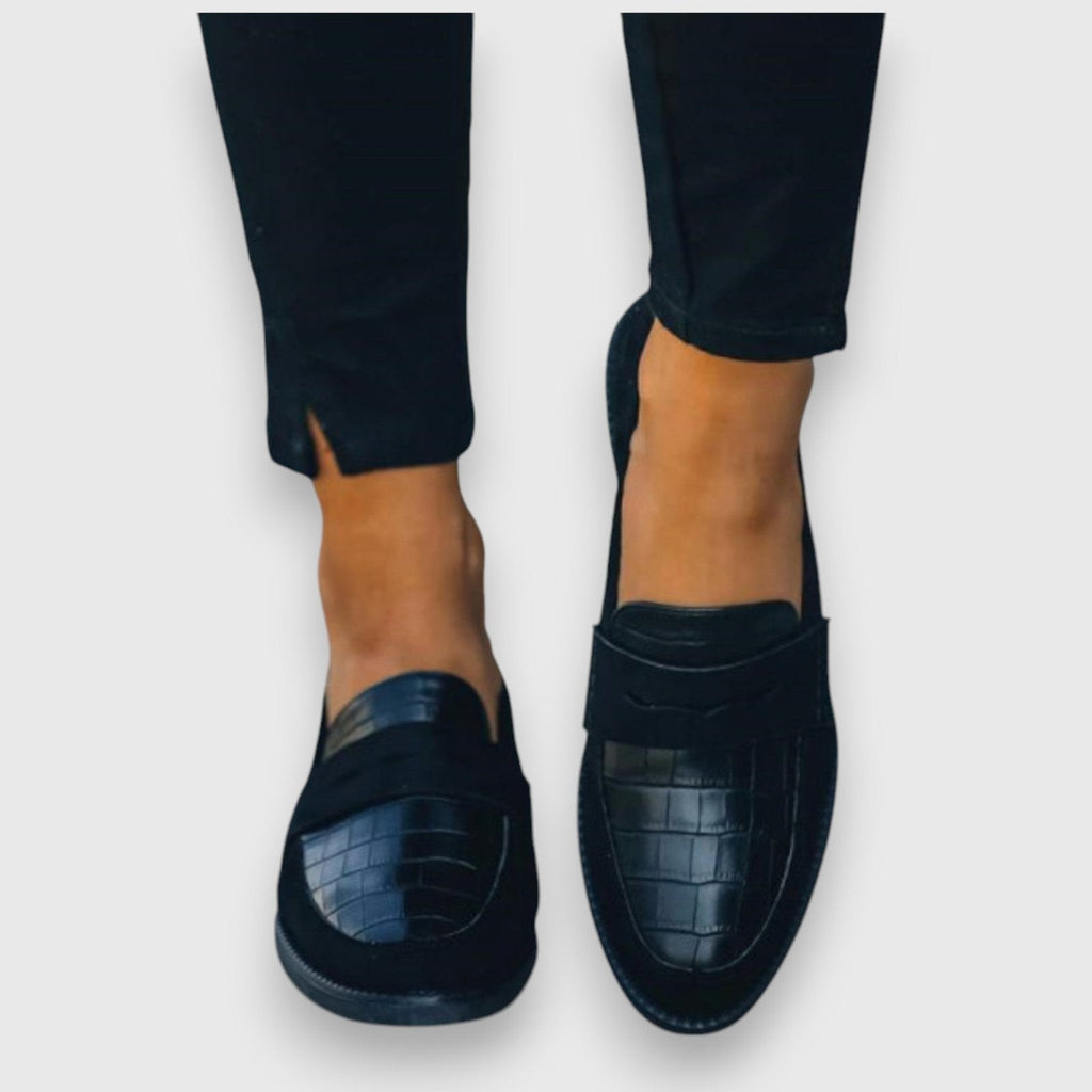 Women's black croc-embossed leather flat slip-on loafers with strap detail