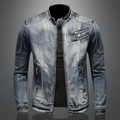 Light blue vintage denim jacket with zip front, stand collar, chest zip pockets