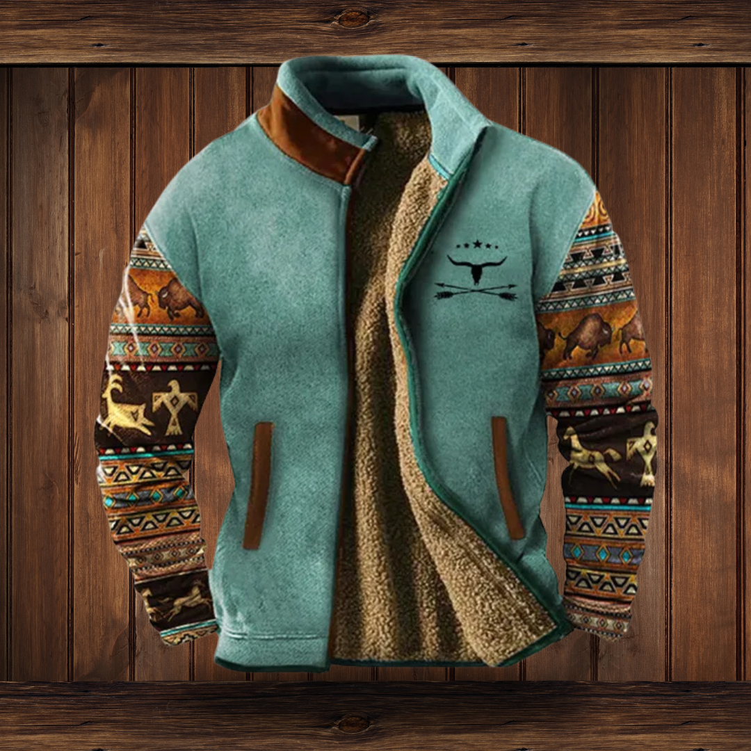 Two-tone merino fleece jacket with patterned sleeves, teal main body, zip front.