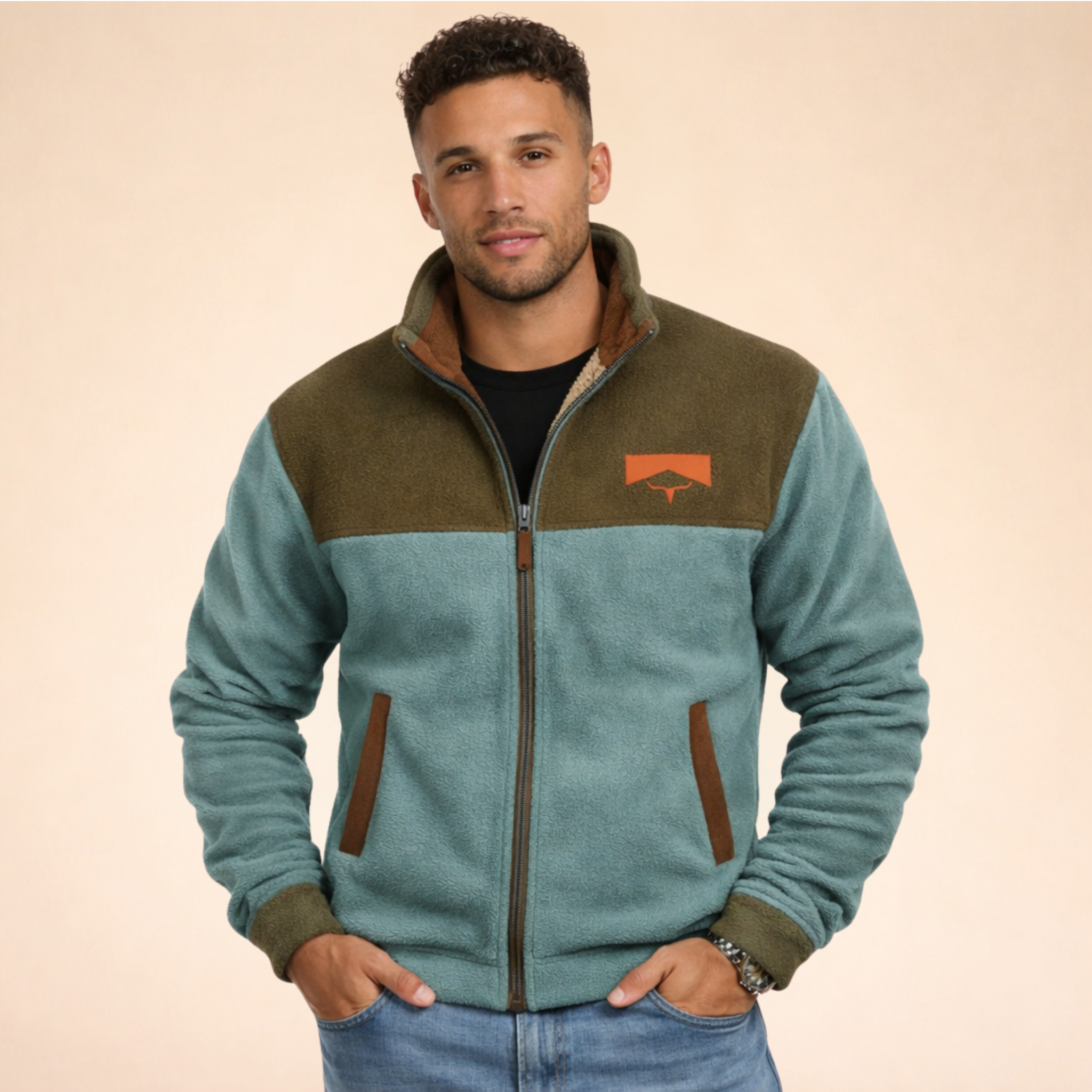 Two-tone merino fleece zip jacket, olive and teal blocks, stand collar, pockets.