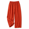 Women’s high-rise wide-leg trousers in orange with elastic waistband