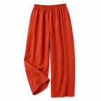 Women’s high-rise wide-leg trousers in orange with elastic waistband