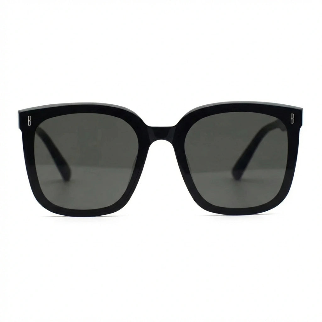 Oversized square sunglasses, glossy black frames with dark tinted lenses