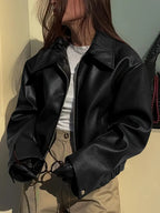 Women’s relaxed fit zip-up bomber jacket, black faux leather look, zip front, dropped shoulder