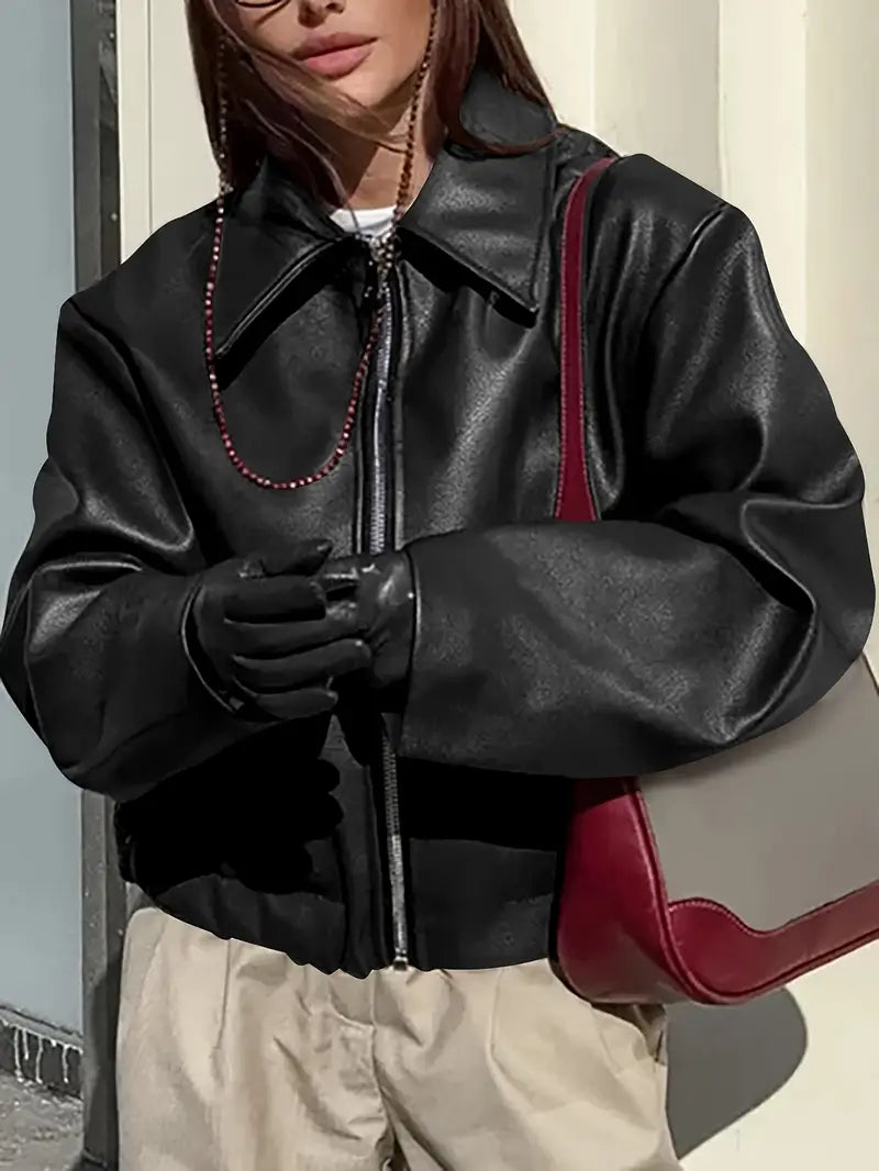 Women’s relaxed fit zip-up bomber jacket, black faux leather look, zip front, ribbed cuffs