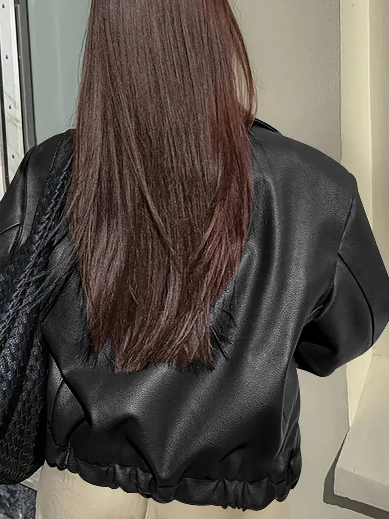 Women’s relaxed fit zip-up bomber jacket, black faux leather look, back view, ribbed hem