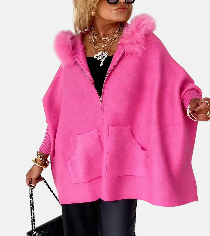 Hot pink hooded coat with zip front, front pockets, and plush fur collar