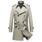 Beige double-breasted trench coat with notched lapels, epaulets, and belted waist